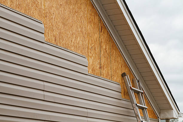Professional Emergency Siding Repair technician working in Hookstown, PA